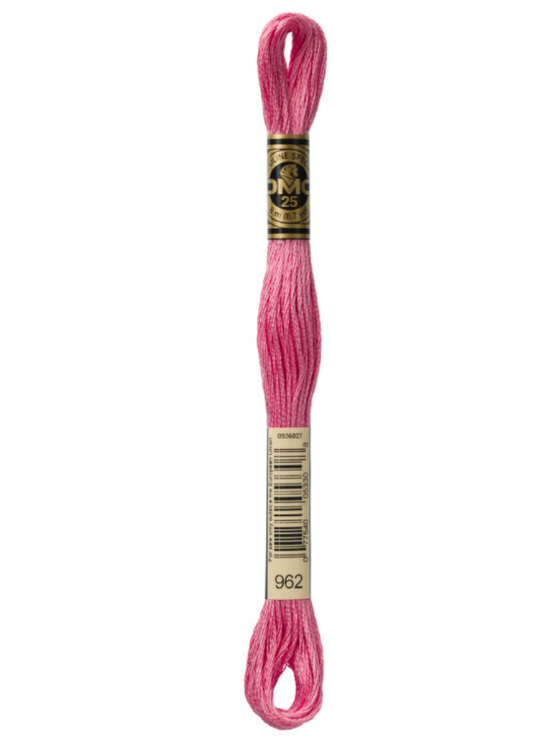 dark pink embroidery floss on a white background