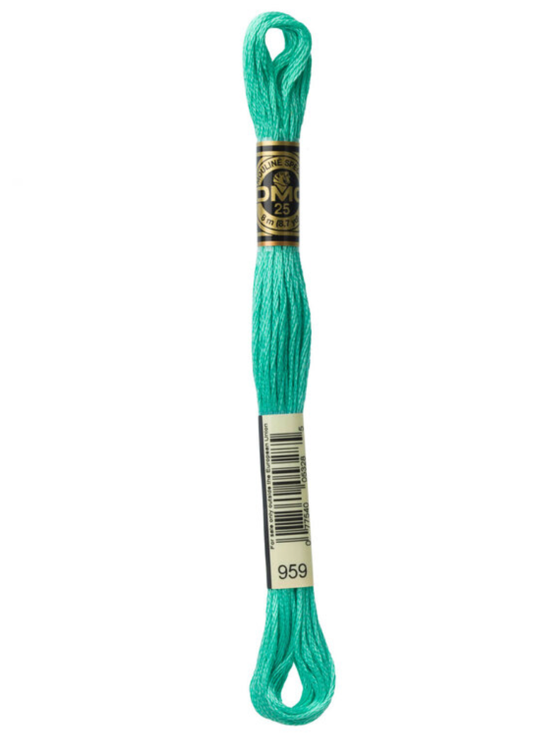 Turquoise embroidery floss with a label on a white background
