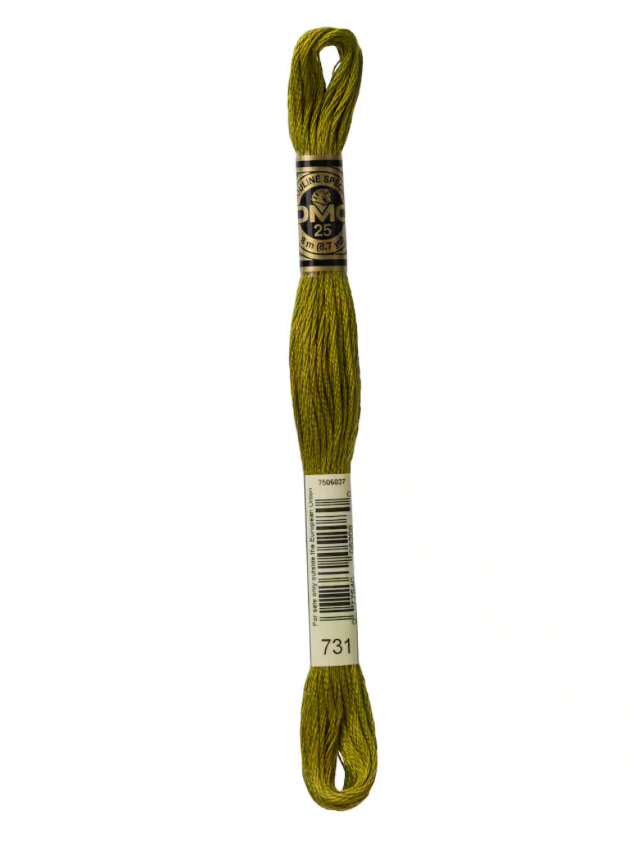 Green embroidery floss skein with a label on a white background