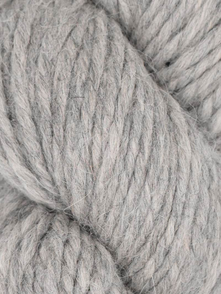 Close-up of gray yarn with a slight texture