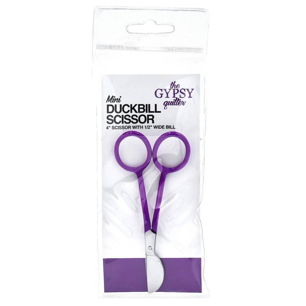 Purple duckbill scissors in packaging with 'The Gypsy Quilter' branding on a white background.