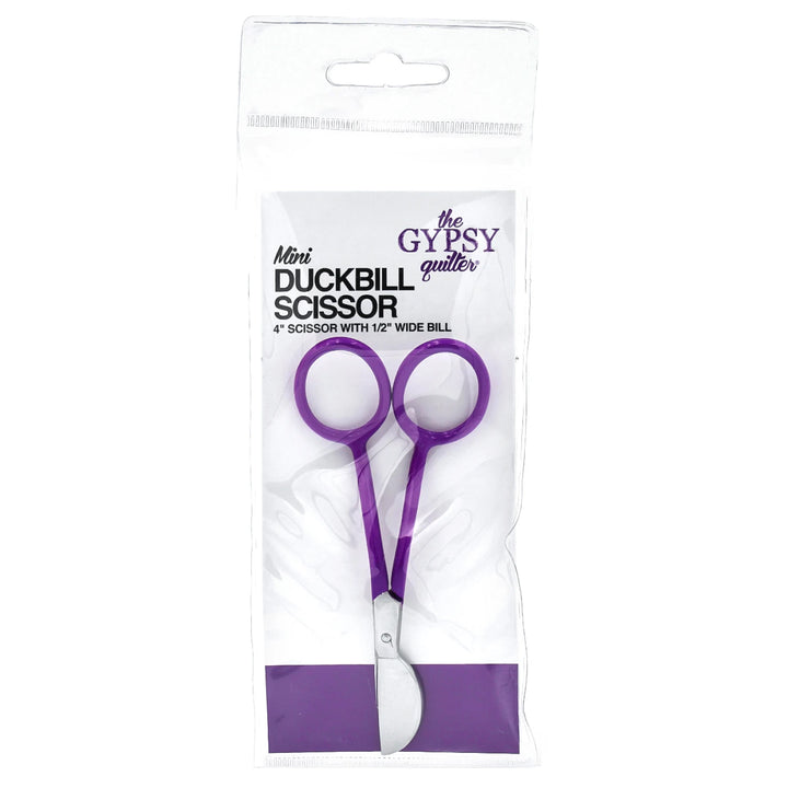 Purple duckbill scissors in packaging with 'The Gypsy Quilter' branding on a white background.