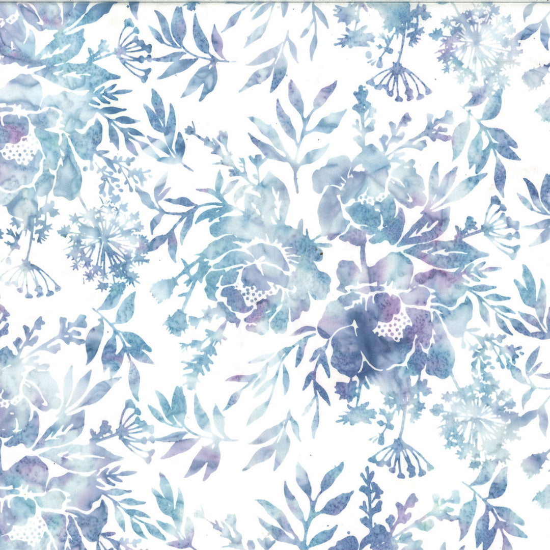 White Bali Batik fabric with flowers in shades of purple and blues