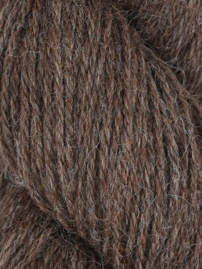 Close-up of brown yarn with visible texture