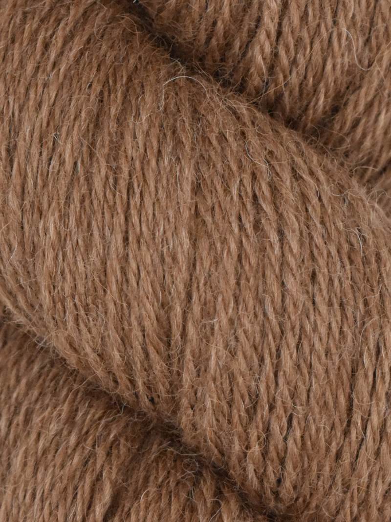 Close-up of brown yarn with a soft texture