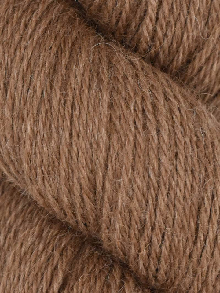 Close-up of brown yarn with a soft texture