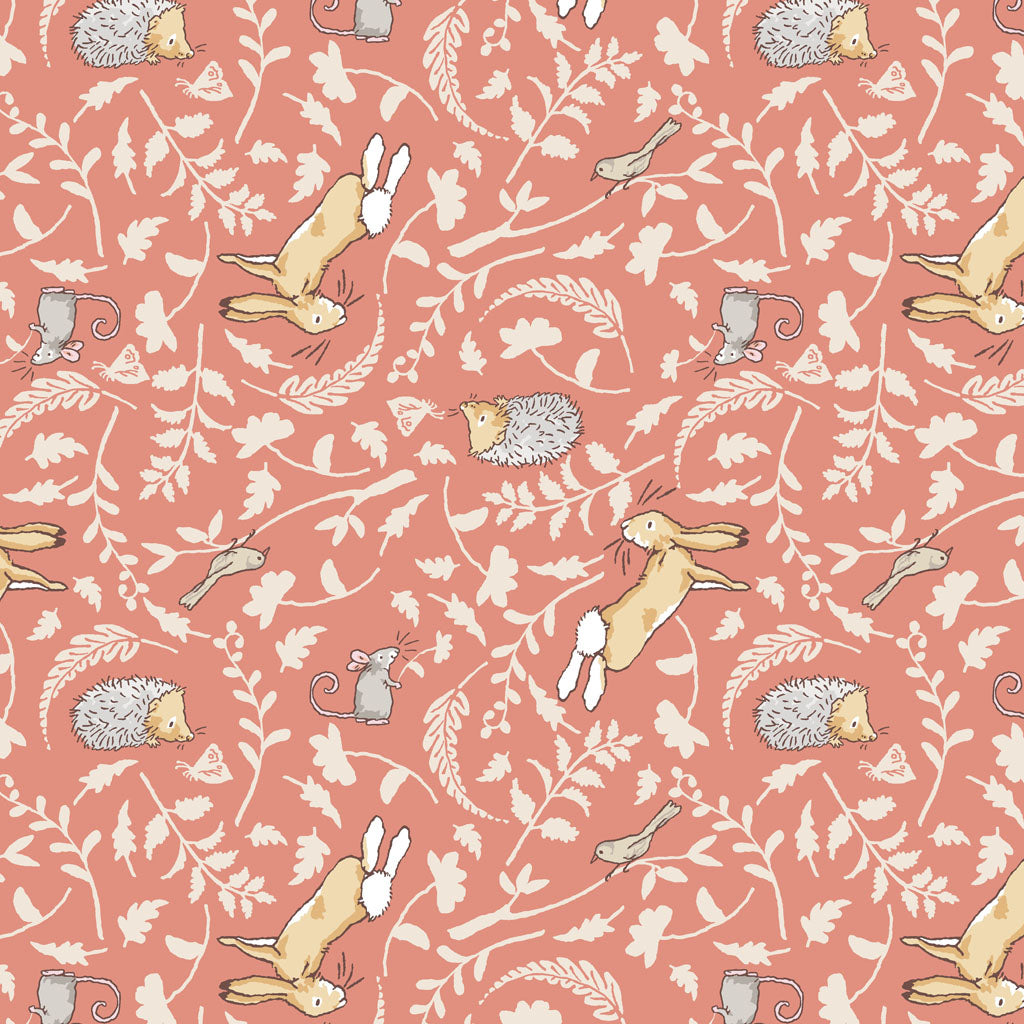 coral fabric covered with brown bunnies, hedgehogs, mice, birds and leaf motifs