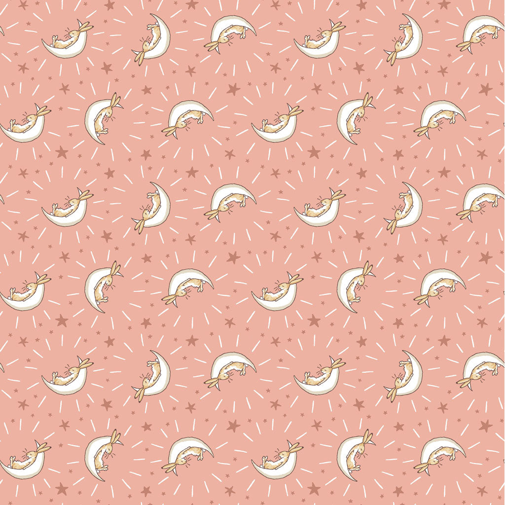 Coral fabric with white half moons with bunnies sitting on them