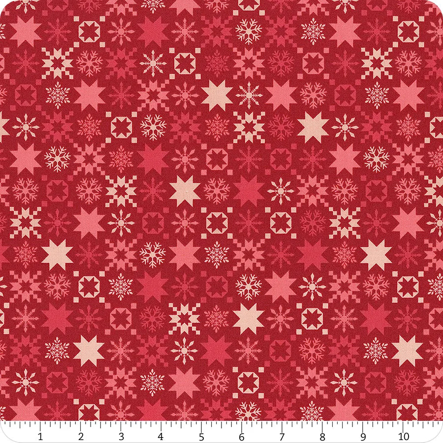 Red fabric with an assortment of red snowflakes