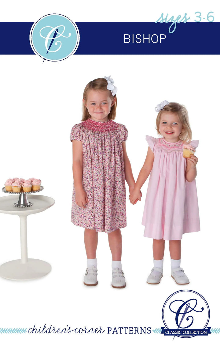 2 girls in dresses on a pattern front