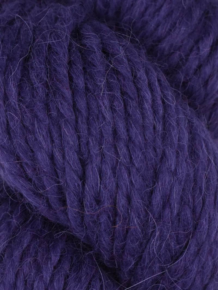 Close-up of dark purple yarn with visible texture