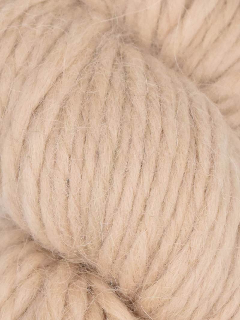 Close-up of beige yarn ball