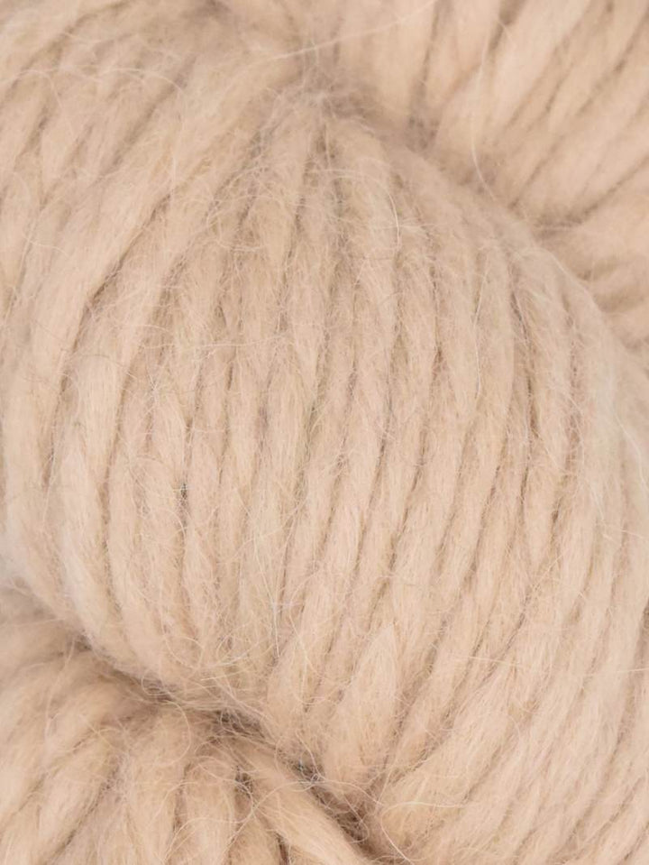 Close-up of beige yarn ball