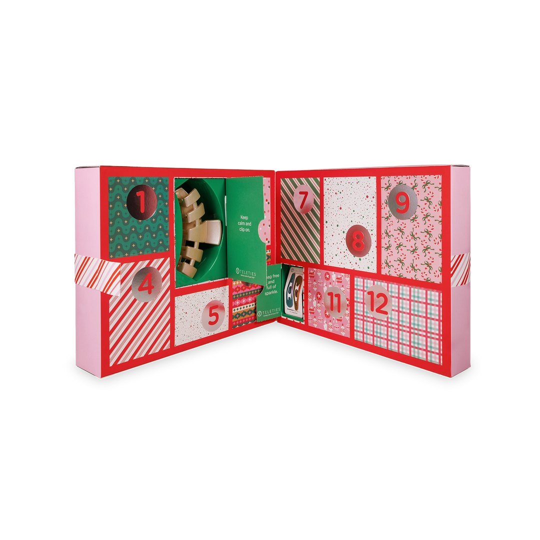 Advent calendar with various compartments on a white background