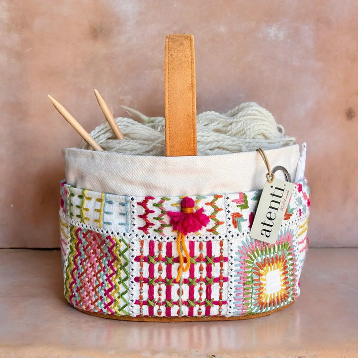 Atenti knitting and crocheting bag with colorful assorted stitches.