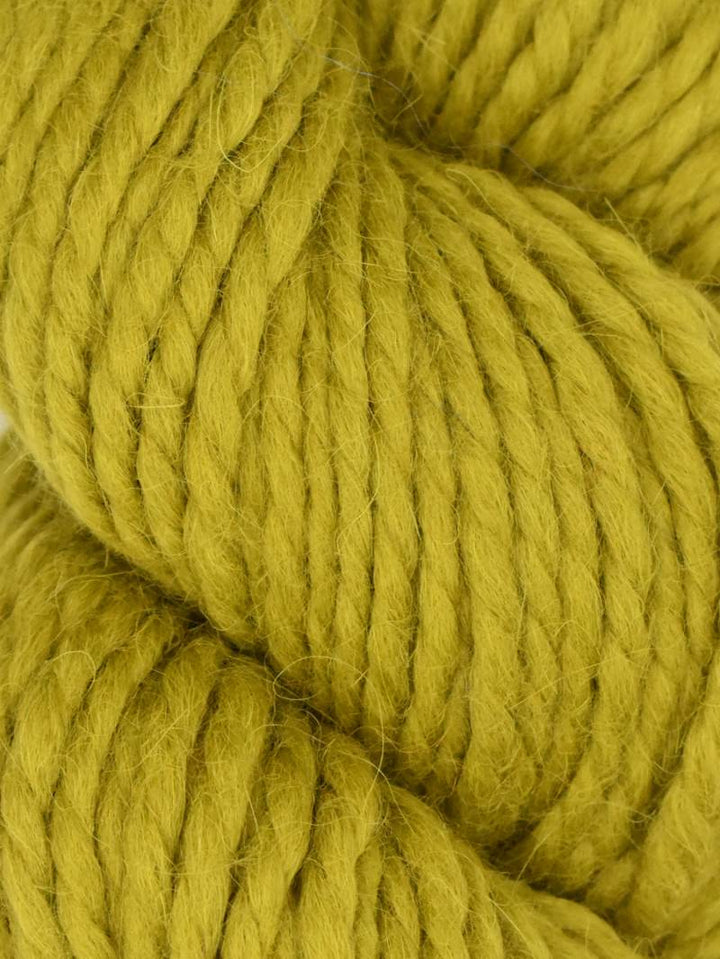 Close-up of a ball of bright green yarn