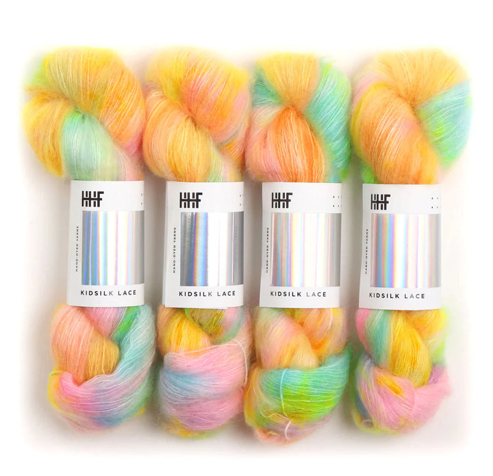 Kidsilk Lace yarn. Orange, blue, green, pink, and yellow.