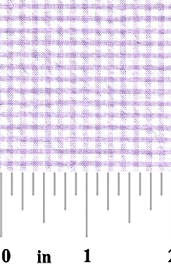 Purple gingham fabric with a ruler at the bottom for scale