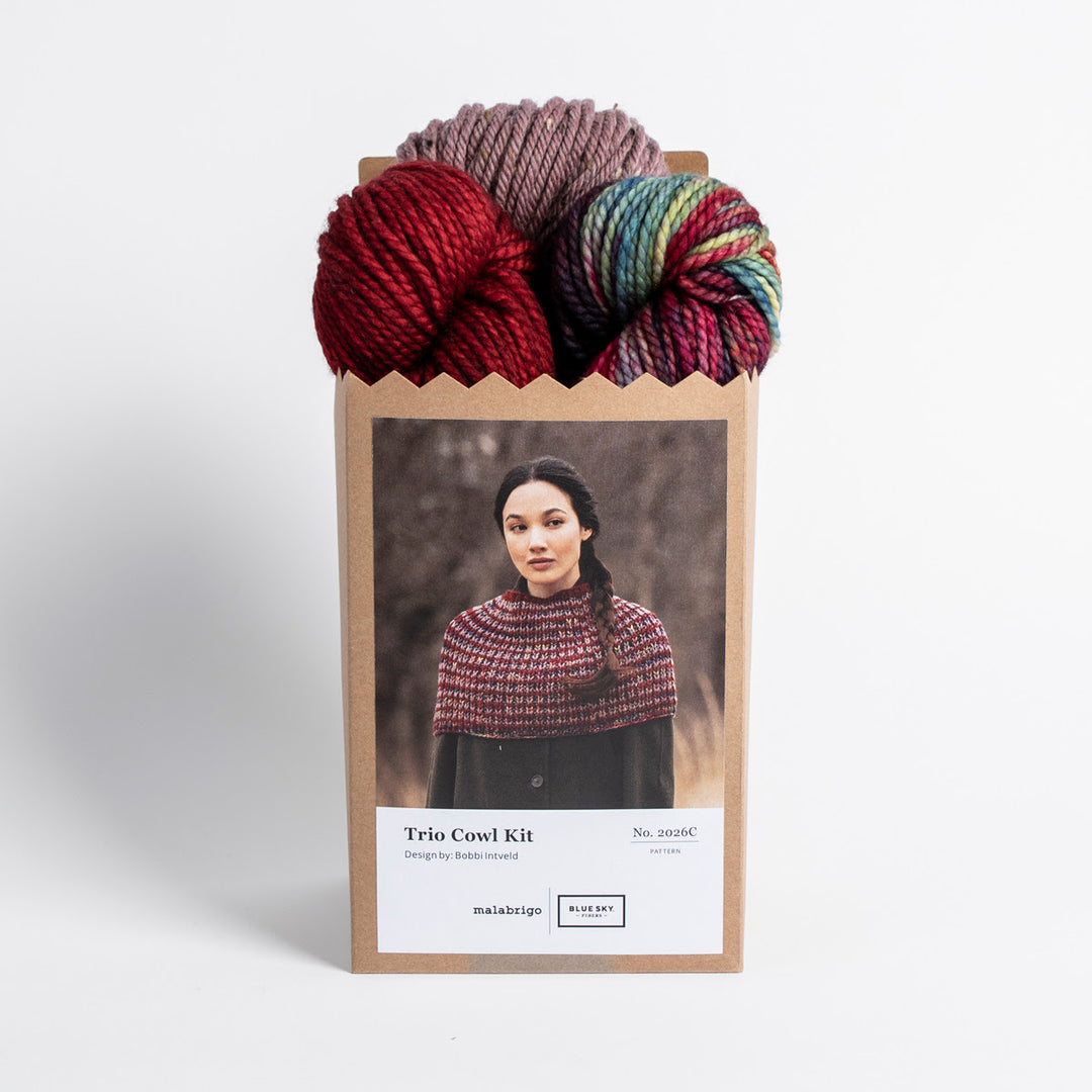 Knitting yarn set with a photo of a person wearing a knitted cowl on a white background