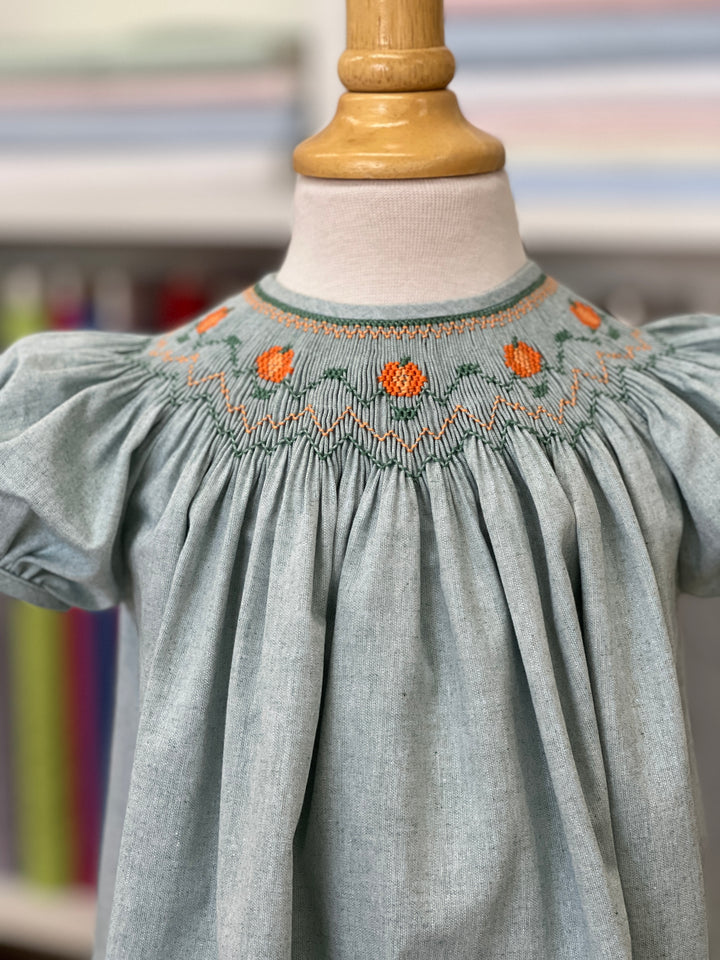 Green pumpkin smocked dress